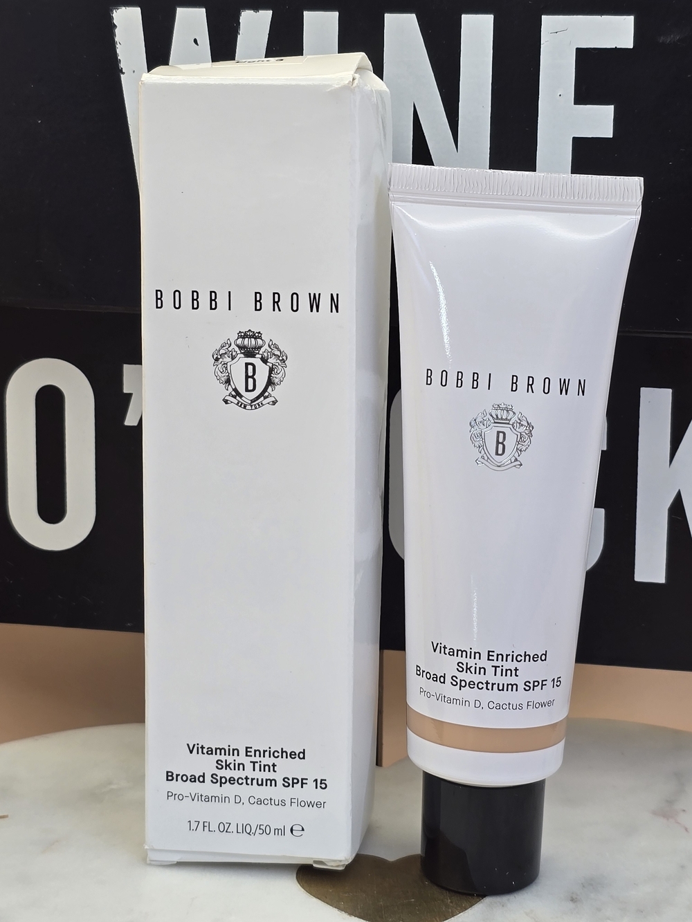 Bobbi Brown Skin Tint Tube in White and Black Accents